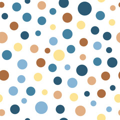 Blue and brown polka dots in a pattern on a white background