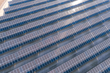 Grid of solar panels in rural area