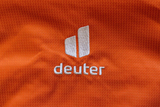 Krasnodar City, Russia - 10 June 2023: Deuter orange backpack frontside close-up