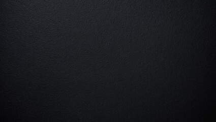 Seamless texture of black sponge foam as a background, ethylene vinyl acetate material, fine sandpaper-like quality.