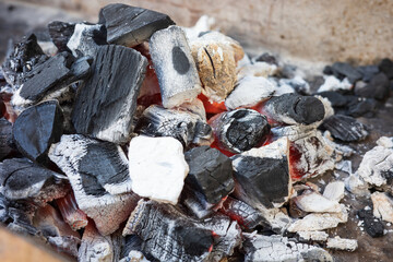 Grill preparation. Light the fire using charcoal ready to prepare food.