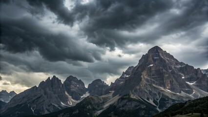 Obraz premium Mountain range under stormy sky