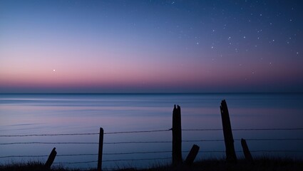 Calm evening sea and twinkling stars in the sky