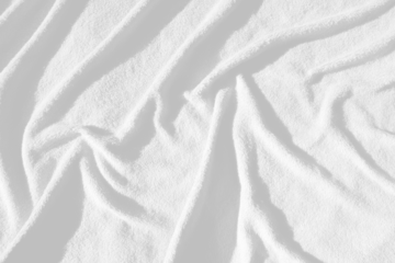 Black and white abstract grunge texture background of crumpled pleated textile