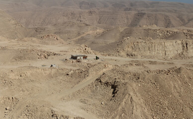 Desert scenery with a house on the road trip from Hurghada to Cairo, Egypt