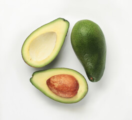 Group of fresh avocados on a white background. Top view.