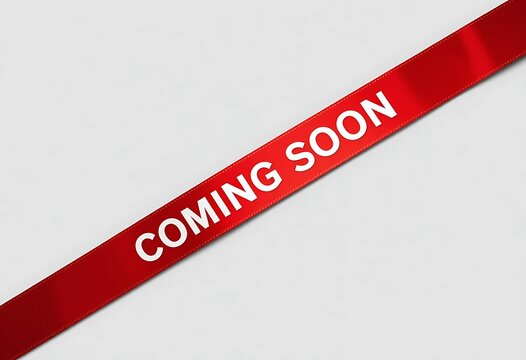 Red ribbon with Coming Soon announcement diagonally across a plain white background Simple bold text Anticipation
