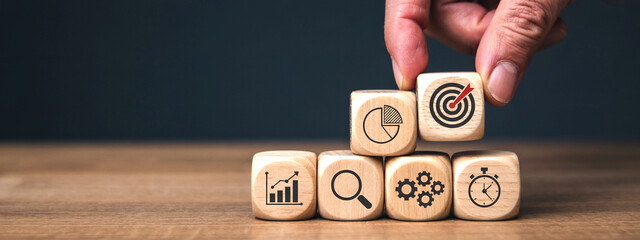 Business Pyramid with Wooden Blocks - Analytics, Goal Setting, and Team Concept