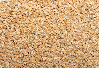 Spelt flakes isolated, dry raw rolled flat oat grains, wheat, oatmeal or bran, barley rye cereals