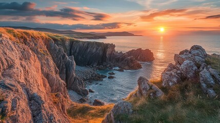 Dramatic sunset over coastal cliffs