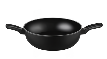 A black wok with two handles centered on a black background in a studio product photography shot