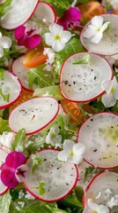 Colorful salad with fresh vegetables and edible flowers served at a summer outdoor gathering