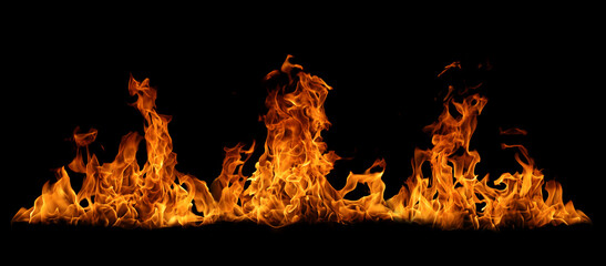 Abstract flame isolated on black background. Burning effect. Flames in the night sky.