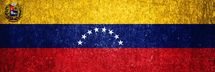 Venezuela state flag on a metal surface. Banner of dirty grunge Venezuela flag.