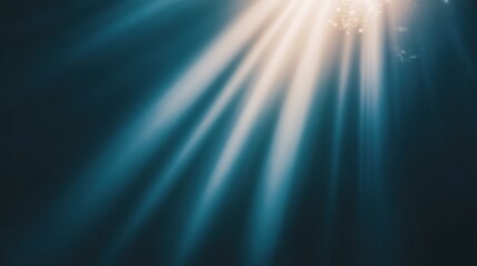 Sunlight rays underwater creating tranquil atmosphere of blue serenity