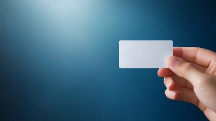 Blank white business card in hand, versatile template for branding and contact information