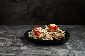 Delicious Pulled Pork Tostadas with Cabbage, Tomato, and Cheese