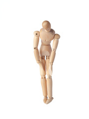 A Wooden dummy with hands down, conveying sadness. A Poseable figure and Articulated mannequin capture a moment of despair, perfect for artists and creating expressive, emotional sketches.