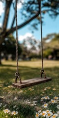 Empty Wooden Swing Hanging From Tree In Park With Flowers On Sunny Day, Tranquil Scene