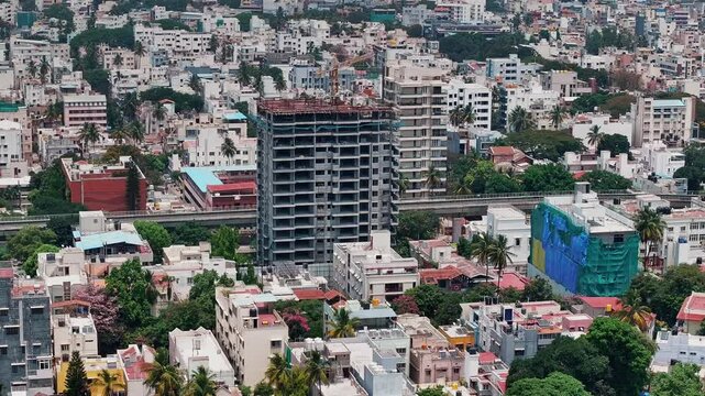 Aerial view of the modern high-rise skyscrapers in Bengaluru, Karnataka, showcasing the city's dynamic skyline. Cityscape highlights Bengaluru's blend of urban development and architectural brilliance