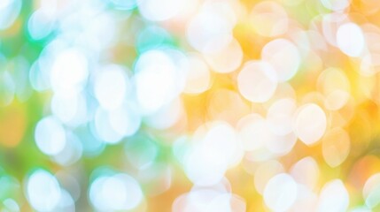 Obraz premium Colorful bokeh background with soft blurred light circles in blue and orange