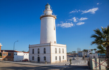 White lighthouse in the city of Mlaga, Spain, in a sunny day