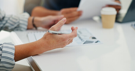 Business, hands and discussion with documents in meeting for financial pitch, funding proposal and corporate planning. Finance, stakeholder and people with feedback, project budget and brainstorming