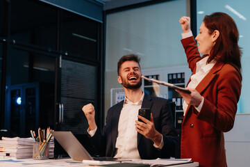 Businesspeople coworker in office Happy to be successful partnership teamwork success concept.