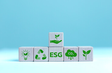 
ESG The concept of helping the world Sustainable corporate development Environmental and social accounting ESG on wooden blocks Environmental, social and governance concepts