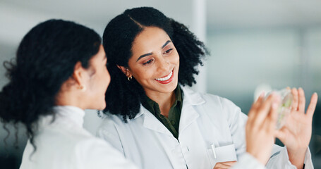 People, scientist and plant in petri dish in lab for research, growth inspection and agriculture study. Smile, women and check leaves with natural innovation, medical solution and experiment progress