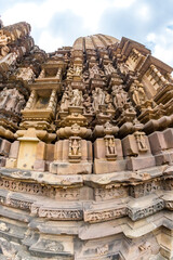 Sculptures on the wall of vamana temple in Khajuraho, Madhya Pradesh, India.Unesco world heritage site.