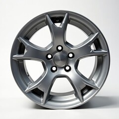 Obraz premium Close-up of brand new silver alloy car wheel on white background, close-up, wheel, background