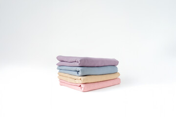 hijab headscarf fabric folded in many color on a white background