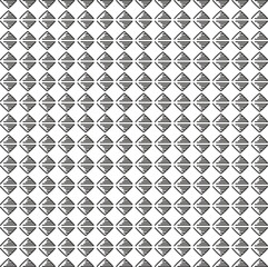 The texture consists of triangular objects repeating in mirror symmetry.