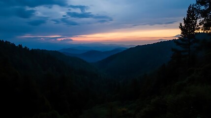 Naklejka premium Majestic Sunset over Misty Mountain Ranges.