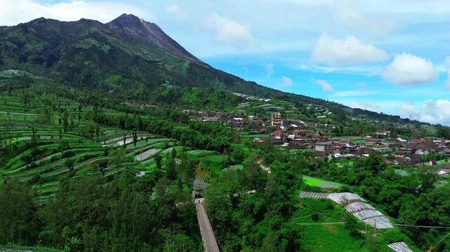 view the top of the merapi mountain java island with the green field