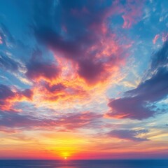 Fototapeta premium Vivid sunrise painting the sky with hues of orange pink and blue over a tranquil ocean horizon creating a serene and breathtaking seascape