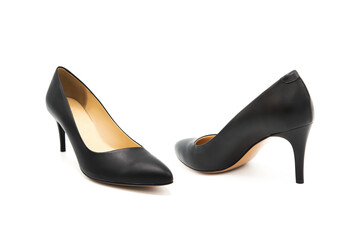 Pair of fashionable classic leather shoes on high stiletto heels isolated on white background. View...
