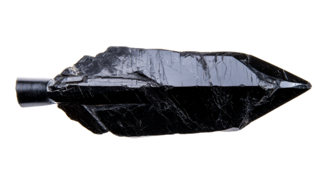 Dark mineral specimen with pointed tip on a black background, cut out transparent