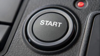 Hand poised to push start button, showcasing vehicle ignition control technology on dashboard for exciting journey ahead.