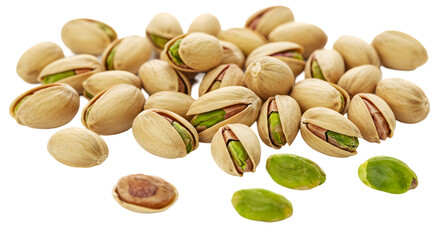 A close up shot of a pile of pistachios with some shells open on a black background in a studio shot