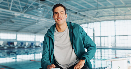 Coach, swimming pool or portrait of happy man with confidence for exercise program. Gym teacher, indoor facility and proud male personal trainer in fitness center for wellness or training performance
