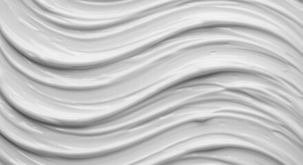 Obraz premium Close-up view of smooth, flowing white cosmetic cream texture.