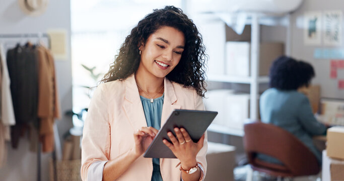 Fashion, woman and ecommerce with tablet for logistics, business management and stock in workshop. Supply chain, female seller and smile with tech for inventory, online order or shipping confirmation