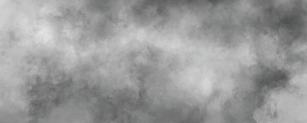 Softly blended storm cloud-like watercolor wash in dark gray and black tones

