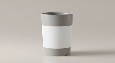 Gray tumbler with blank label.