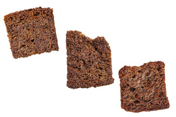 Brown rye croutons, toasts.. Isolated on transparent background.