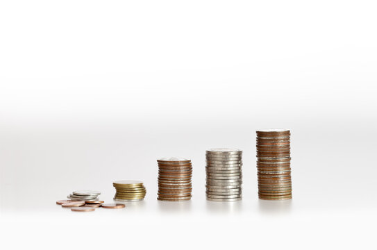 Stacks of coins arranged in ascending order, representing financial growth