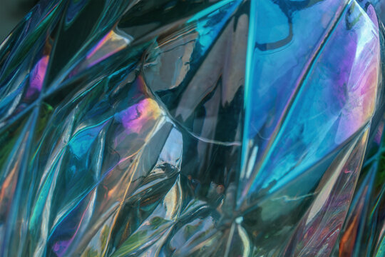 Abstract image with vivid multicolored light reflections on a glass surface