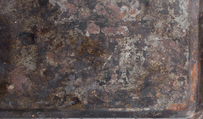 Top view of old stained cookie sheet, vintage cookie sheet, oxidized sheet pan